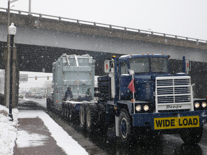 Heavy Load Passing Under Bridge